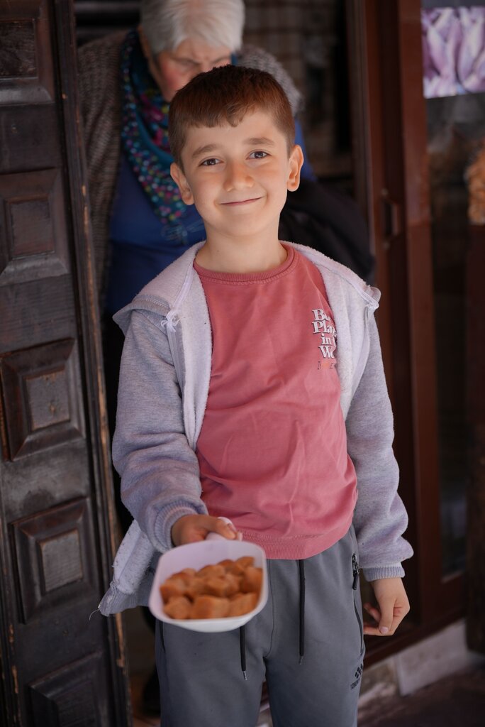 My brother helps everyone and shares his things. He is very ______.