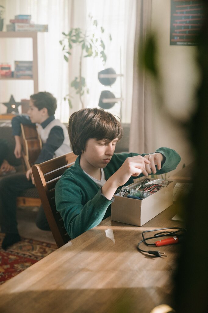When Lucas opened the box, he stared at the contents without saying anything. He looked at his parents, then back at the box. “But… how did you know?” he finally asked. His dad smiled and said, “You've been talking about it for months.”