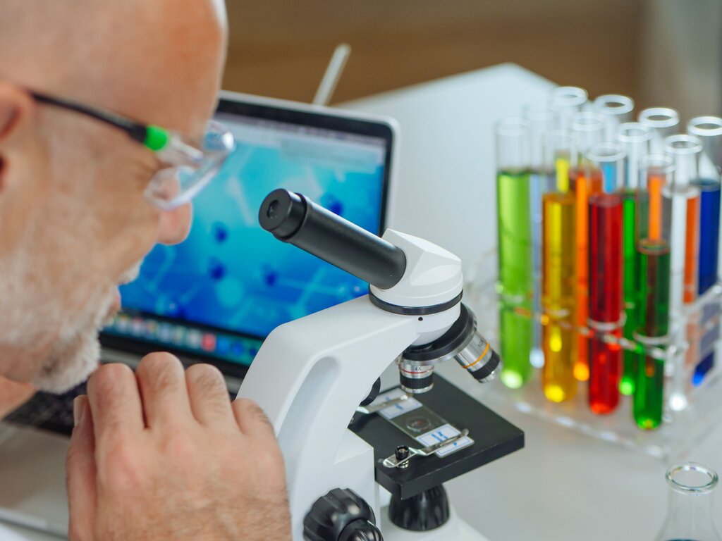 The scientist spent several hours __________ the unusual changes in the experiment.
