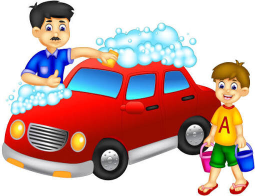 Dad is ________ the car.