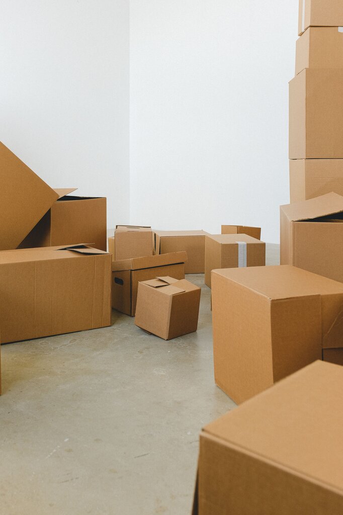 There are boxes in the room.