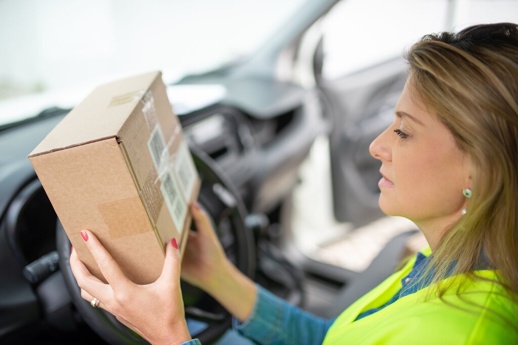 Who drives to houses to give people parcels?