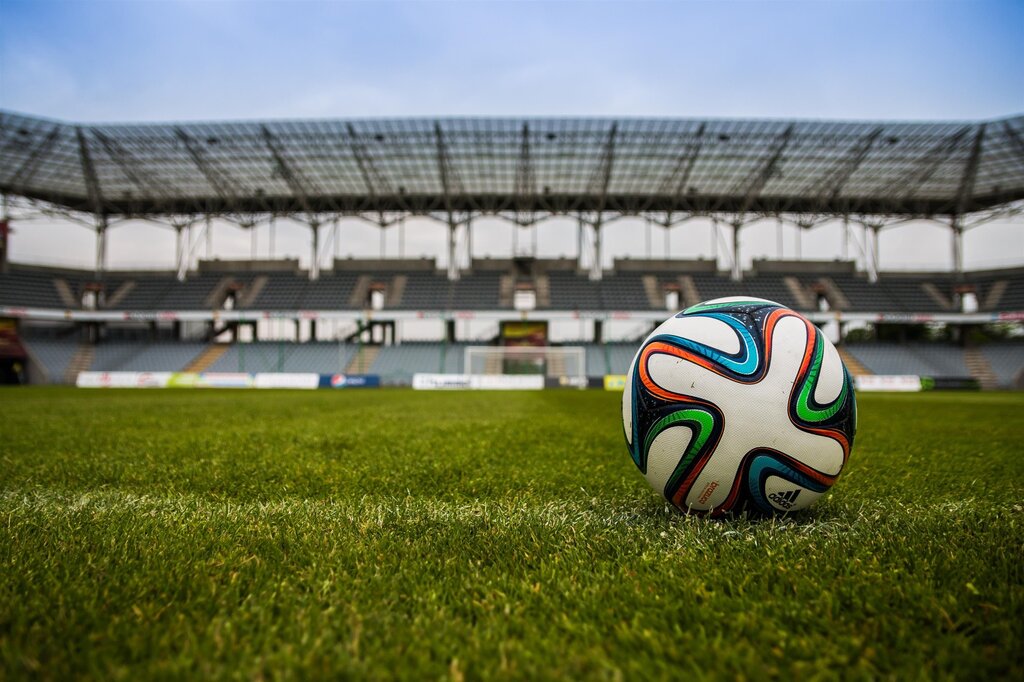 an activity played for enjoyment, entertainment, or competition that involves rules, objectives, and interaction between players or teams