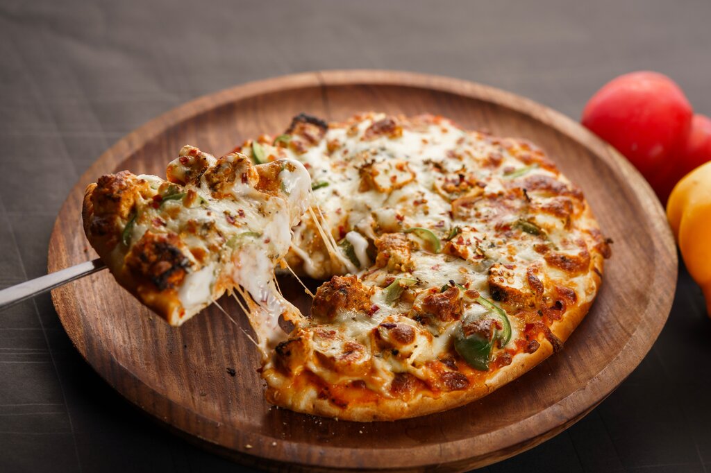 What does “serve the pizzas” mean?