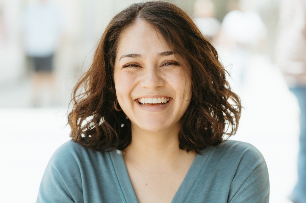 A person who is always happy, smiling, and full of energy.