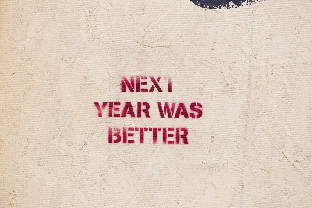 B) wasn't

