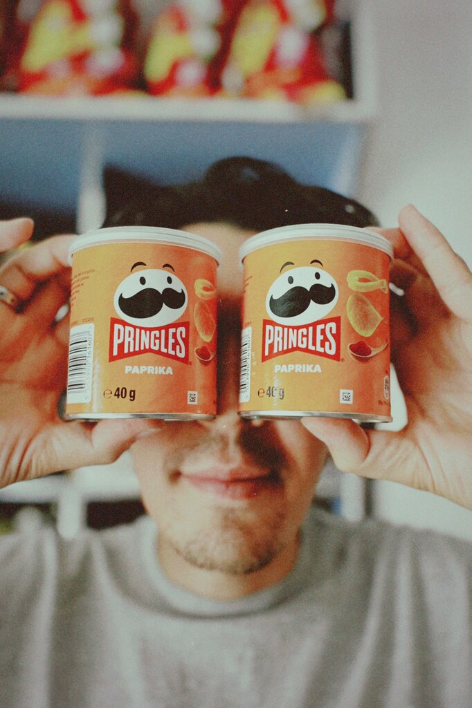 Pringles cans are famously shaped like a tube because the chips themselves are shaped like a: