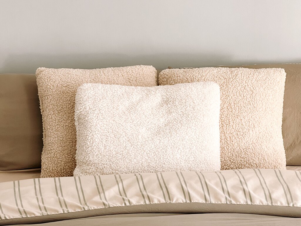 How many pillows are there on the bed?