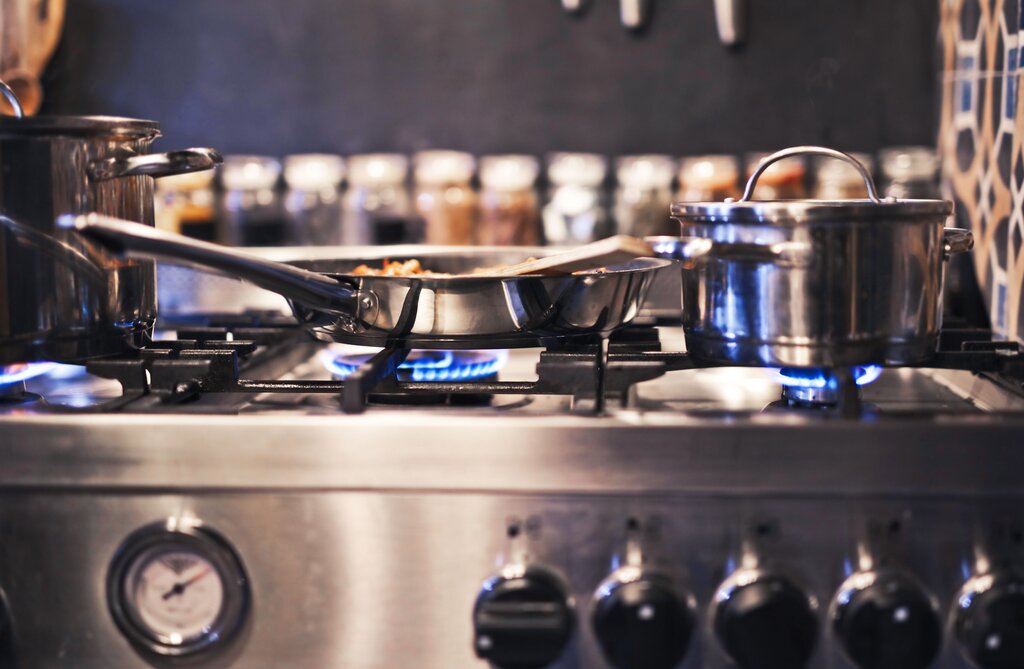 How many pans are there on the stove?