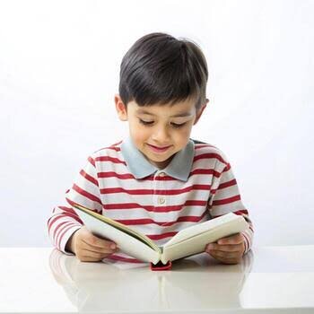 is he reading a book?